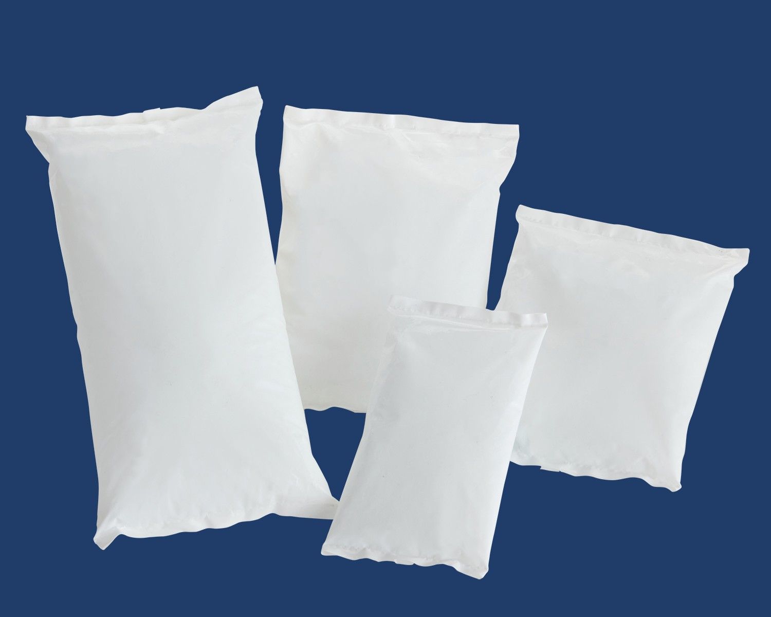 a picture of 4 different sizes of mat white gel packs on a dark blue background 