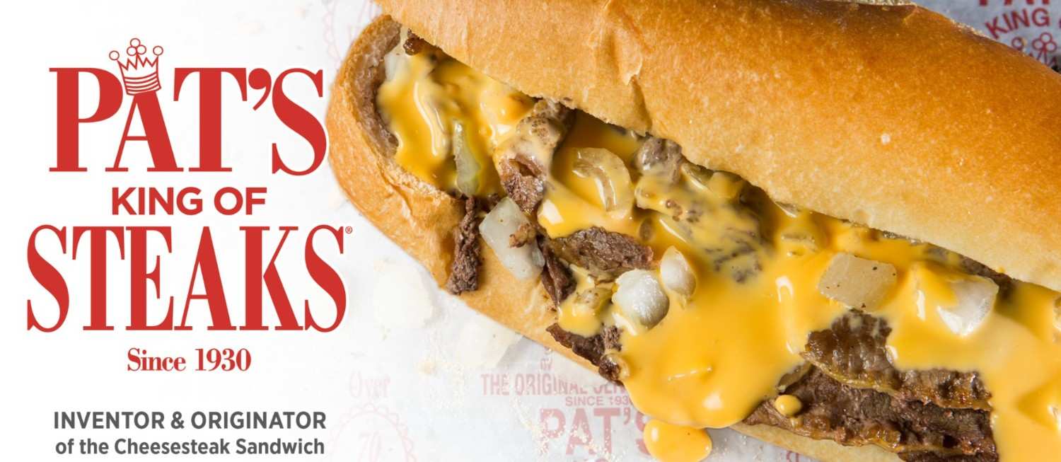 Background picture of a PKS cheesesteak sandwich