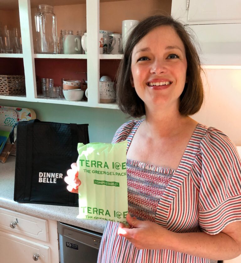 a woman holds a compostable gel pack